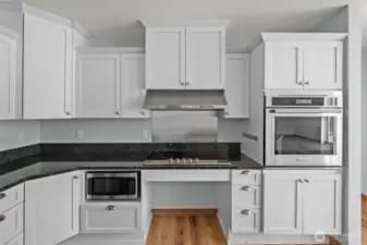 Well designed kitchen, with plenty of counterspace and cabinets. SS appliances