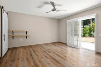 Lovely sliding barn door leads to the spacious en suite.