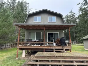 Quaint cabin-style home set on a rare double lot
