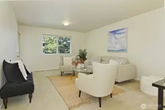 Lower level family room with a private separate entrance.