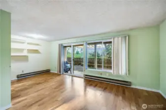 The dining room and living room together create a large space, offering many options for furniture layout and entertaining.