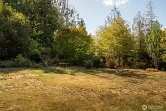 A generous, fully usable yard provides plenty of space for play, gardening, or gatherings—all tucked away in a peaceful, private setting.