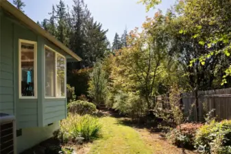 The property features mature, well-planned landscaping that creates a beautiful setting with minimal effort.