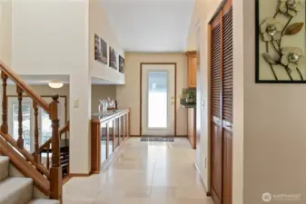 View from front entry door. Left upstairs to bedroom. Next left downstairs to rec room/bath/laundry/patio/backyard. Straight ahead to sun deck with kitchen on the right. Immediate right to living and dining room.