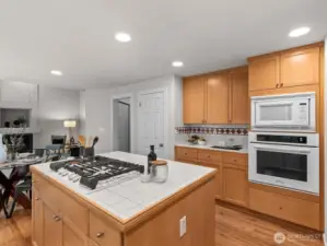 The center island houses the new gas stove, but it's also wired for electric if you prefer.