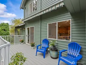 Off the kitchen is an electric awning which not only provides shade in the hotter months, but a dry spot if you wanted to sit out and enjoy the nature that surrounds you during the wetter months.