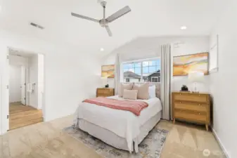 Vaulted ceilings in primary with abundant lighting