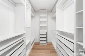 Gorgeous custom closet in the primary suite