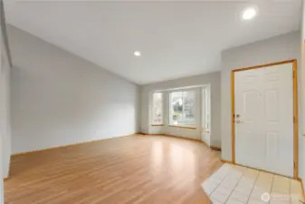 Front entry door flows into spacious living room