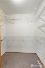 Walk-in closet in primary bedroom