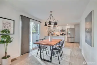 An abundance of natural light fills the dining/living room.
