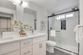 The primary bathroom was recently remodeled and includes a dual vanity, as well as, a dual shower.