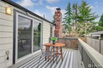 The deck off of the kitchen/dining room is a perfect place to enjoy the sun while sipping on your morning coffee.