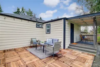 The private side patio is a great space for entertaining guests.