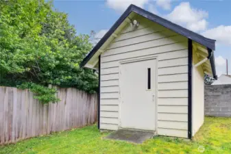 The garden shed provides extra storage.