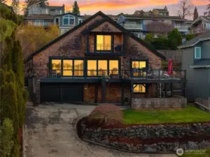 Being located on the hill protects these view. The oversized deck is a perfect place to view the sunset.