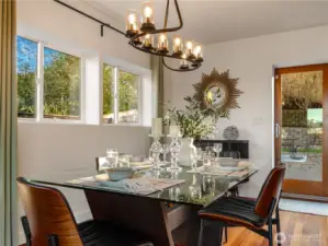 The dining experience is enhanced by the view of the private back yard.