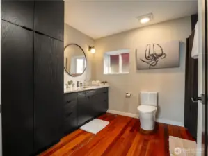 The main floor bathroom has the same nice finishes as the kitchen.