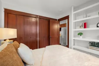 Great storage with built-in shelves and a wall of closets