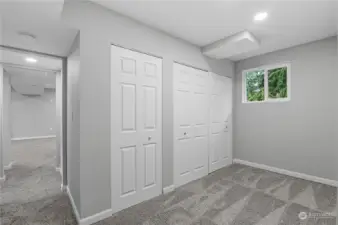 lower level storage area, potential work out space next to laundry closet