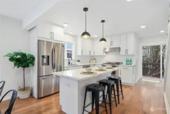 This gorgeous kitchen is the heart of the home. Chef's will love the Bertazzoni gas range and ample counter space.