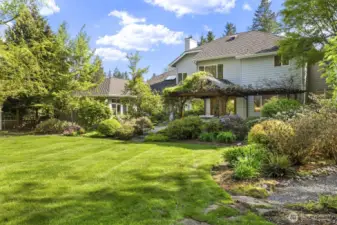 The .84 acre lot enjoys a west facing, fully fenced backyard backing to the trail.