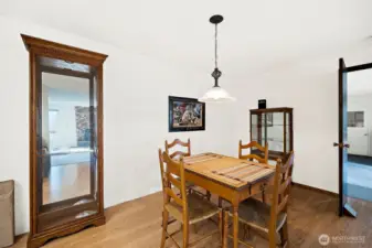 Through the dining room you'll find an additional Great room with possibility for wet bar (door pictured at right)