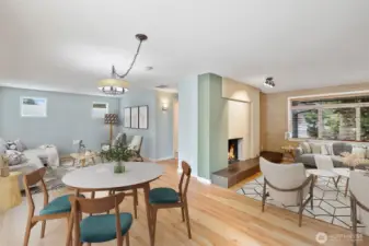 Versatile open spaces—dine, relax, and gather by the fire. French doors lead directly to the patio for Al Fresco dining experience.