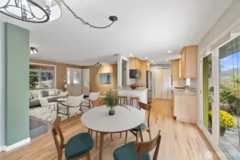 Great-room concept will delight in this entertaining space. Light filled French doors and kitchen with pass-through.
