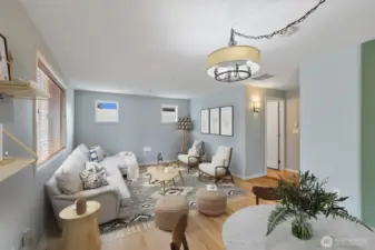 Two separate sitting areas, a cozy TV room with 3/4 bath around the corner. Garage has been fully finished, sheet-rock, textured and Mini-split ductless. Was previously a craft room or could be possible 3rd bedroom.