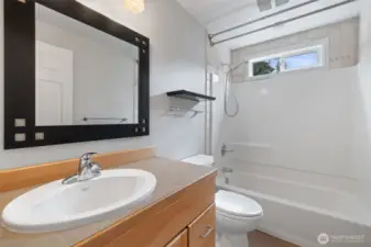 3/4 bath off of the family room/garage area - powder - guest bath space.