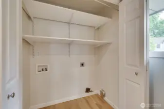 Washer and dryer just off the kitchen for convenience.