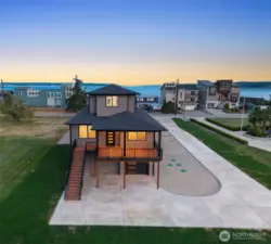 Paved driveway, private, multiple outdoor areas.