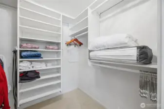 Primary walk-in-closet with custom shelving