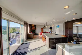 Main floor deck with access from living area and both master suites.