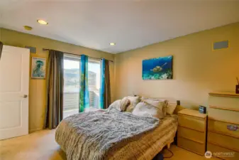 Main floor second ensuite bedroom with deck access.