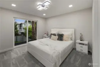 Master Bedroom with exit to the backyard facing deck