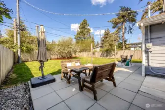 Large level yard, fully fenced. Perfect for entertaining, gardening, relaxing