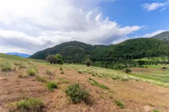 View looking Southeast towards the town of Twisp only 1.5 miles away to amenities.