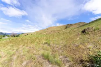 Spring skies from property above Twisp River Road.
