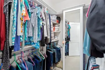Walk-in Closet w/ Custom Built-ins and Additonal Storage
