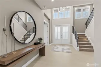 Two Story dramatic entry. Legrand Q Motion motorized shades, Legrand switches & Decora outlets throughout home w/ lights & dimmers. Home automation package includes electronic deadbolt, programmable thermostat, smart switches, video doorbell & smart speakers.
