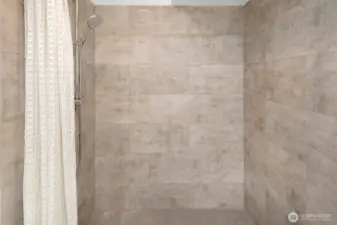 Large walk-in shower with a detachable head is perfect for washing even the largest pooch!