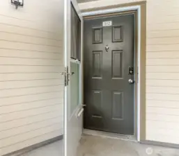 A heavy duty storm door with alternate screen for air circulation.