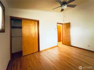 Second bedroom, ceiling fan, vaulted ceiling, hardwood floor, move-in ready