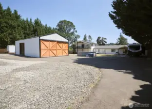 Exterior of shop and tons of parking