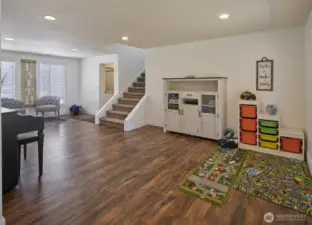 Living room leads to the the upstairs