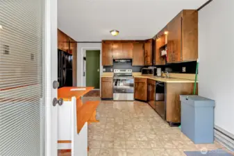 Attached dwelling unit with its own kitchen, bathroom, and laundry.