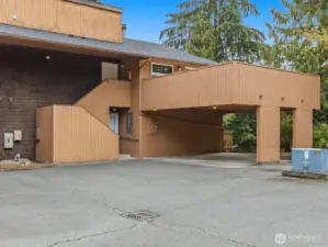 Assigned parking is the right side of the carport.