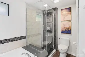 Primary bedroom with 5-piece ensuite bath and large walk-in closet